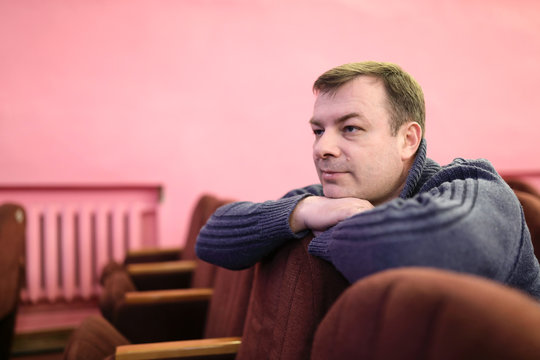 Man watching theatrical performance