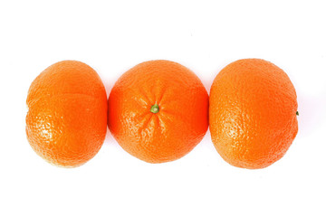 Ripe fresh orange mandarins or clementines or tangerines citrus fruit isolated on white background. Vegetarian concept, Organic vitamins. Organic and healthy fruits.	