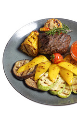 grilled meat with garnish of vegetables