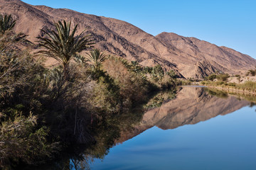 Fototapeta na wymiar River at the Atlas Mountains, south of Morocco