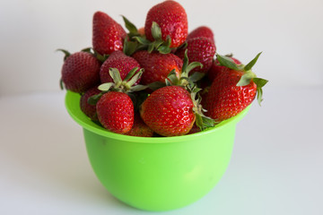 strawberry concept. strawberries isolated. strawberries in the green box.