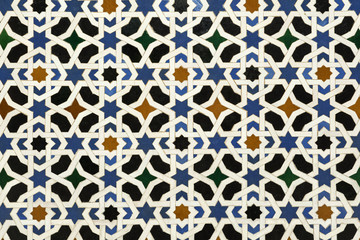 Detail of a mosaic pattern of glazed vintage tiles.