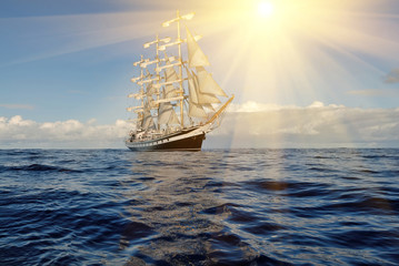 Fototapeta na wymiar Sailing ship and sun rays. Sailing. Yachting