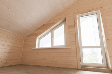 Wooden house interior, room with window