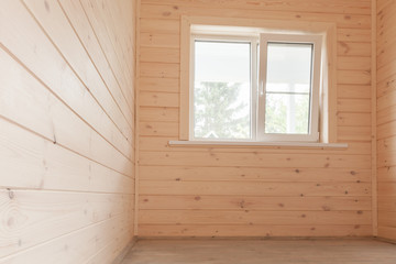 Empty wooden house interior, small room