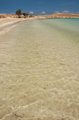 Crystal clear waters of Pori beach at Koufonissi island in Greece