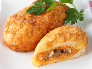 FRIED STUFFED SANDWICH	 - PANECILLO RELLENO FRITO CALLED PEPITO

Traditional Valencian Sandwich called Pepito. Small sandwich stuffed with pisto or ratatouille and deep fried in olive oil.