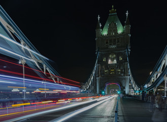 Light trails on Tower bridge at night, London, England