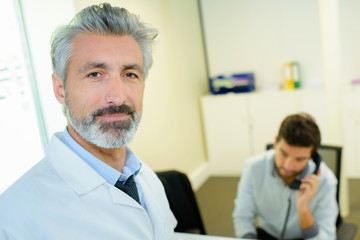 doctor man portrait in an office