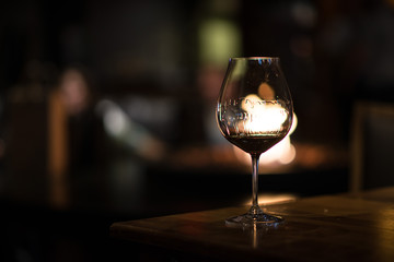 Wine Glass in Tasting Room with Fireplace