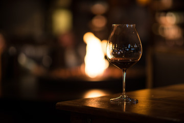 Wine Glass in Tasting Room with Fireplace