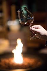 Wine Glass in Tasting Room with Fireplace