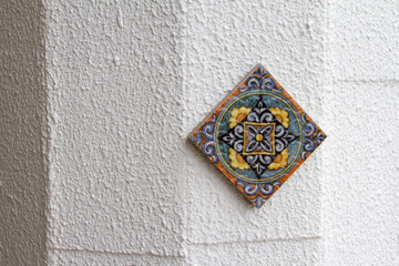Obraz na płótnie Canvas One ceramic tile with oriental pattern on a white background.