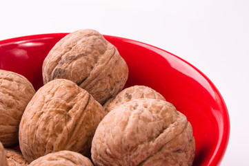 walnuts in red plate