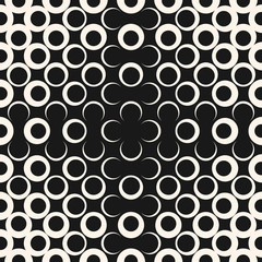 Vector geometric halftone seamless pattern with circles, dots, crossing shapes. Abstract texture in black and white colors. Gradient transition effect. Optical illusion. Trendy modern background 