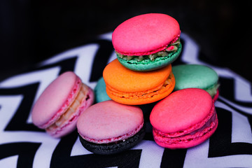 Close up of delicious and fresh multicolored macaroon