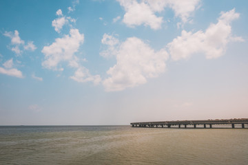 Fototapeta premium highway over ocean - road bridge over water , sky background