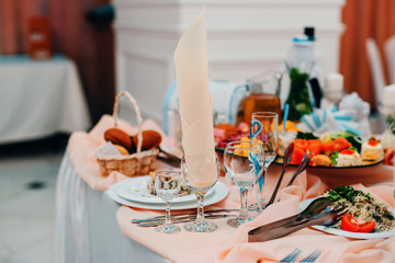 drinks glasses and food on the table for a romantic gala dinner in the restaurant with decor