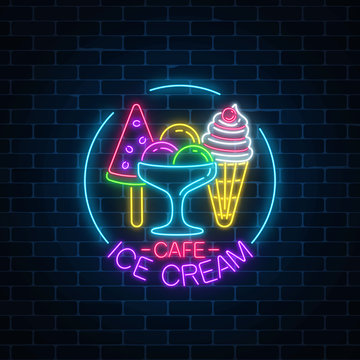 Glowing neon ice cream cafe signboard in circle frame on dark brick wall background. Fruit cone and watermelon ice-cream