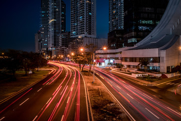 road traffic in modern city at night -  light trails, street traffic