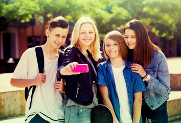 Fototapeta premium Teenagers taking mobile self picture