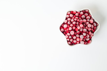 frozen cranberries on white background for your logo and cover