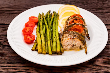 Roasted zander fillet with asparagus and lemon