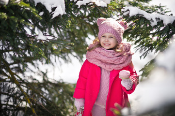 A happy kid with ice cream in the winter forest 944.