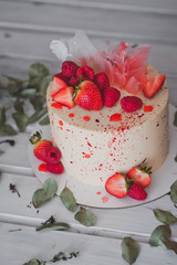 A beautiful cake with strawberry berries as decoration 999.