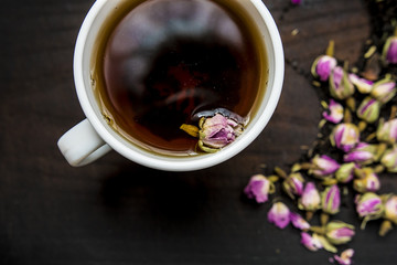 cup with tea rose fragrance menu ingredients wooden