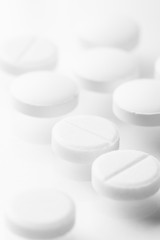 Pharmacy theme, white medicine tablets antibiotic pills.