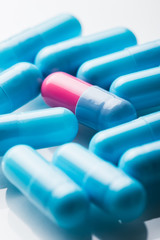 Pharmacy theme, blue medicine tablets.