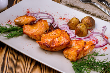 chicken kebab on board