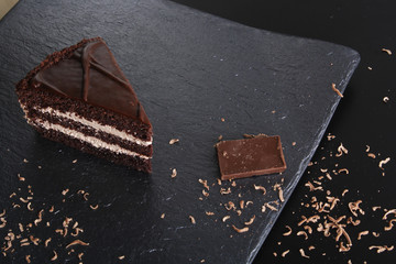 cake prague chocolate dessert on stone background black