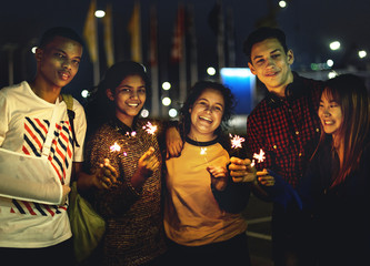 Group of school friends happiness and playing firework