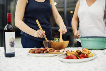 Obraz na płótnie Canvas People preparing food for party