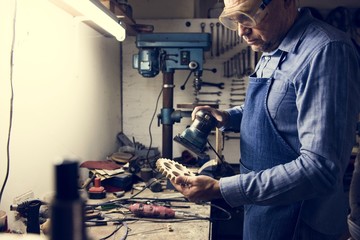 A man is working in a workshop