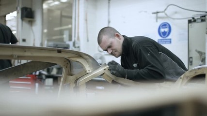 Sports car manufacturing quality control inspection room