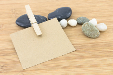Wooden background with brown paper sheets or note.