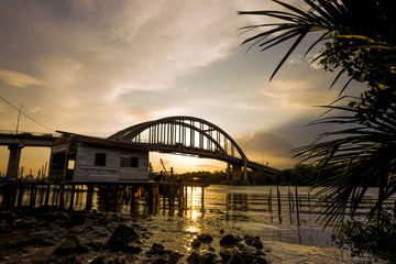 Fototapeta na wymiar sunset near the bridge at Kedah Malaysia