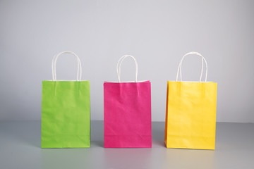 some colorful paper present bag