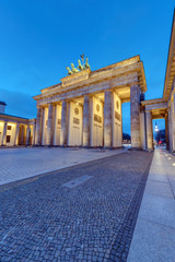Different perspective on the famous Brandenburg Gate in Berlin at dawn © elxeneize