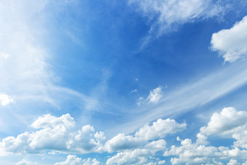 Fototapeta na wymiar Beautiful fluffy clouds with blue sky background.
