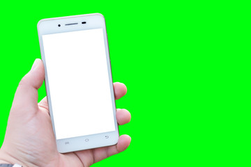Man using smartphone blurred images in green screen background.
