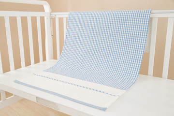 the image of parenting and baby girl crib