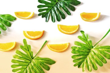 Flat Lay Photo with Fresh Orange and Tropical Leaf ,Background