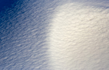 Snow at sunset as an abstract background