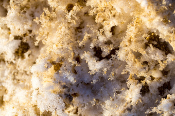 Snow with sand as an abstract background
