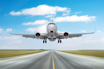Airplane aircraft flying departure after a long flight, landing speed motion on a runway in the...