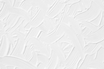 White background with patterns of divorce and brush strokes by hand, rough lines. Texture paint is a light color for wallpaper.